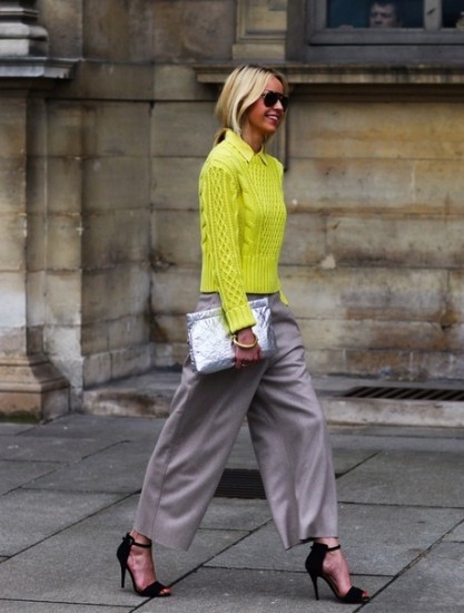yellow Acne jumper + wide leg trousers