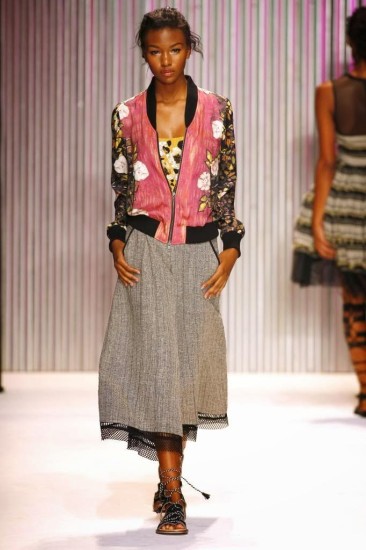 Tracy Reese floral bomber jacket worn with a skirt