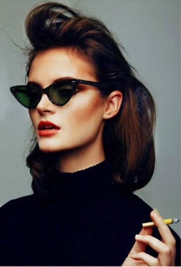 Black Turtle neck with cat wing glasses and red lipstick