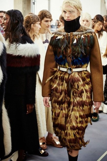 Feather dress worn with black turtleneck sweater backstage at Marni AW14