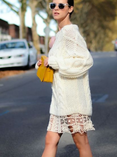 Knitted sweater worn with lace skirt for the street style