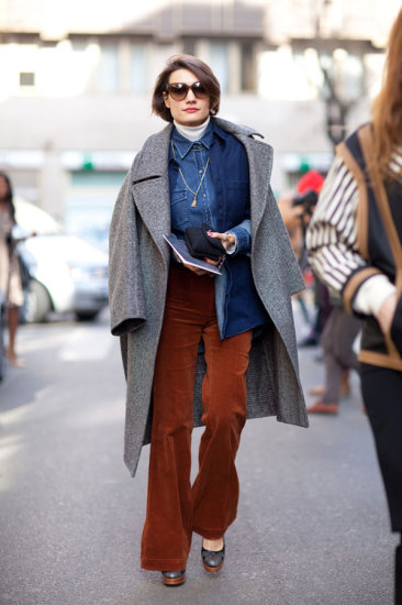Milan street style - oversized coat, velvet trousers, platform shoes, denim on denim layered with a white turtle neck sweater!