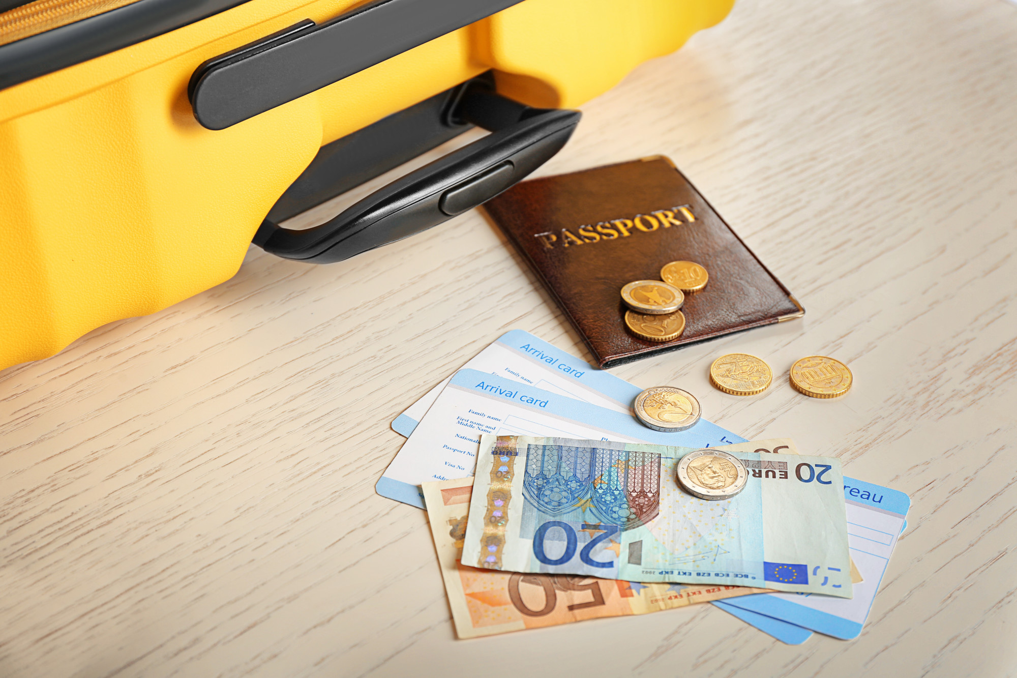 passport money and suitcase