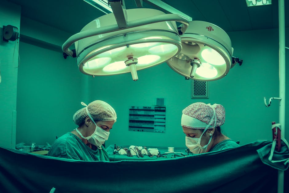 plastic surgeons in operating room