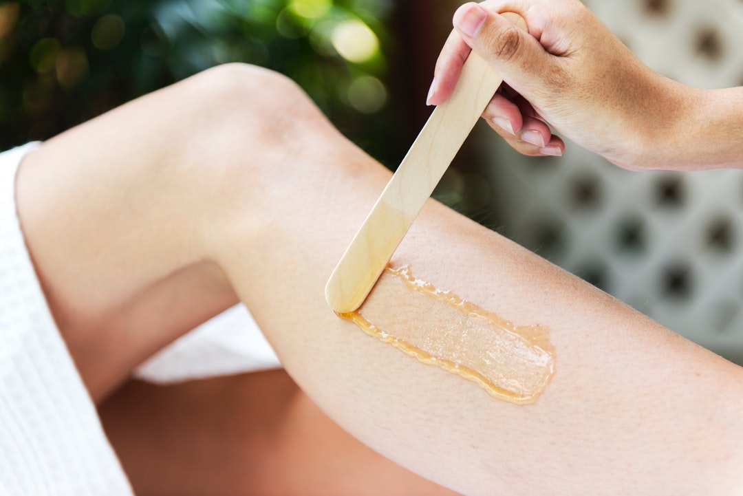 Person Undergoing Sugaring Hair Removal