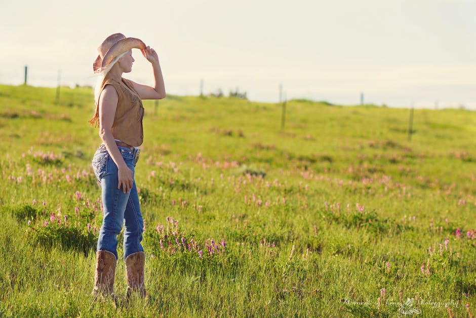 A Cowgirl in a Field
